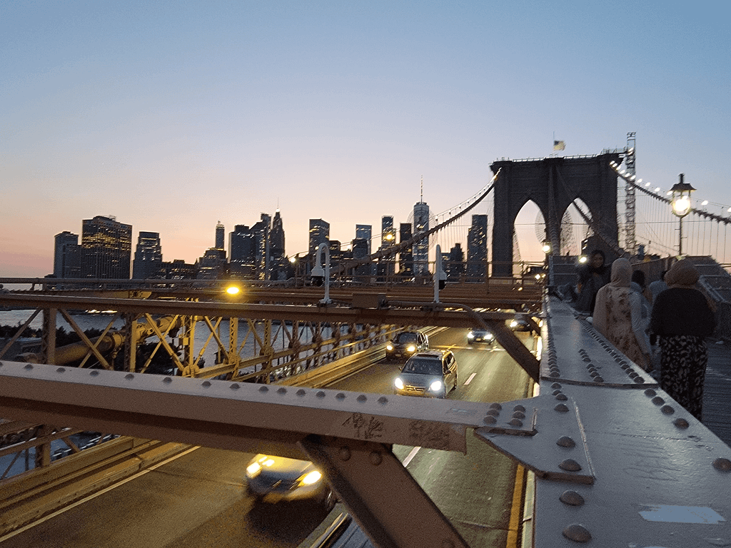 NYC skyline behind Brooklyn Bridge