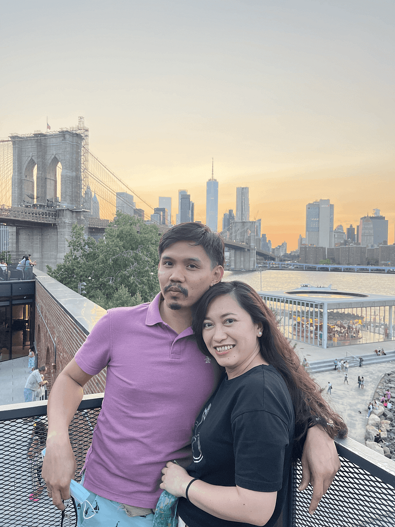 Couple shot with the famous New York City attraction.